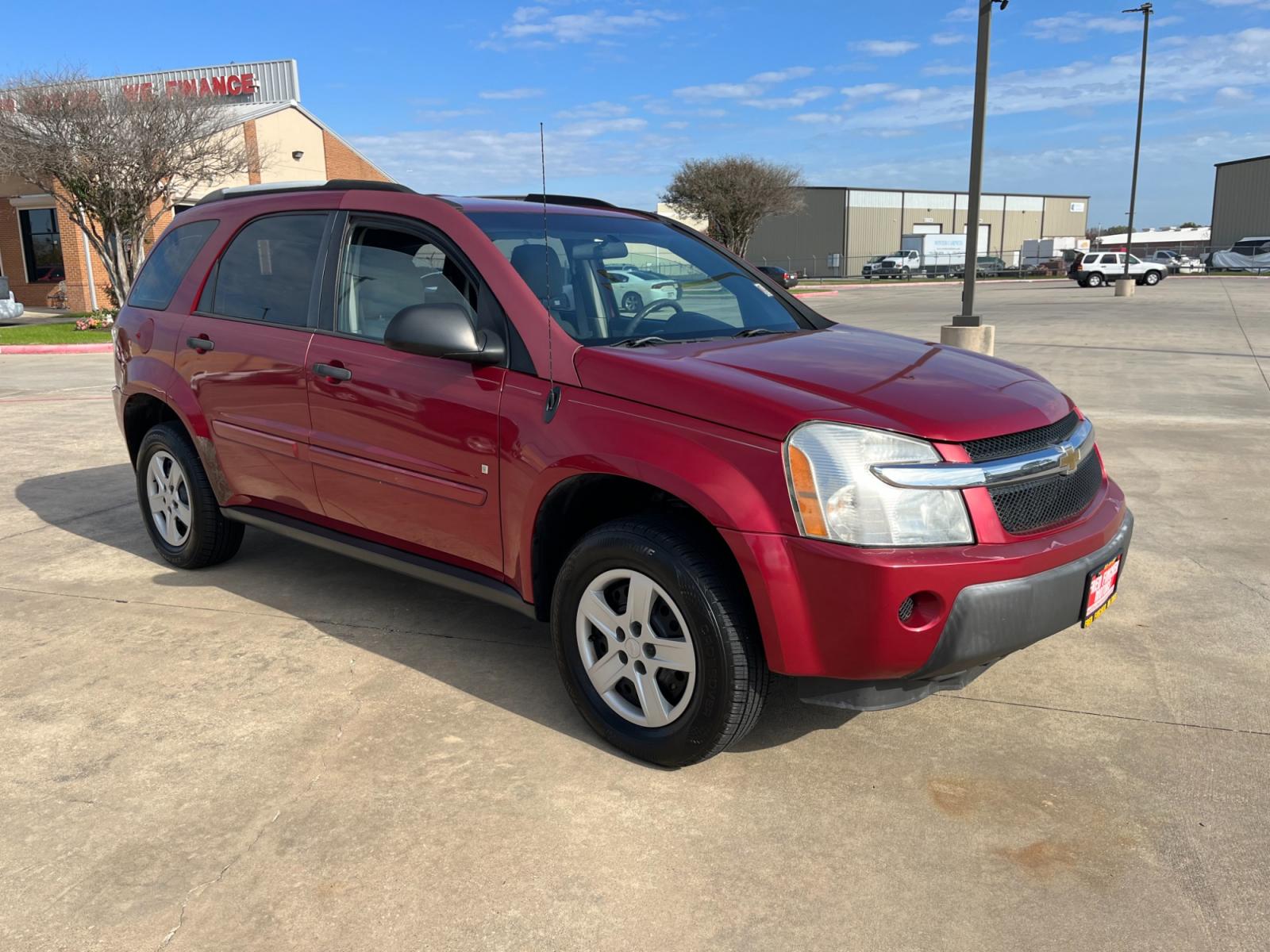 2006 red /TAN Chevrolet Equinox LS 2WD (2CNDL13F366) with an 3.4L V6 OHV 12V engine, 5-Speed Automatic transmission, located at 14700 Tomball Parkway 249, Houston, TX, 77086, (281) 444-2200, 29.928619, -95.504074 - Photo #0